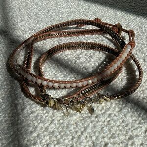 Handcrafted Brown Wrap Bracelet with White Beads and Gold Accents